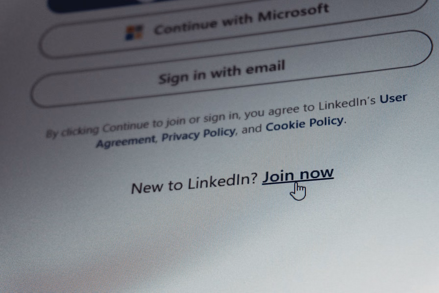 Close-up of a login page on a screen with a cursor hovering over a sign-in link